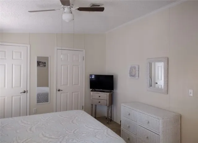 a bathroom with a toilet a sink and a mirror