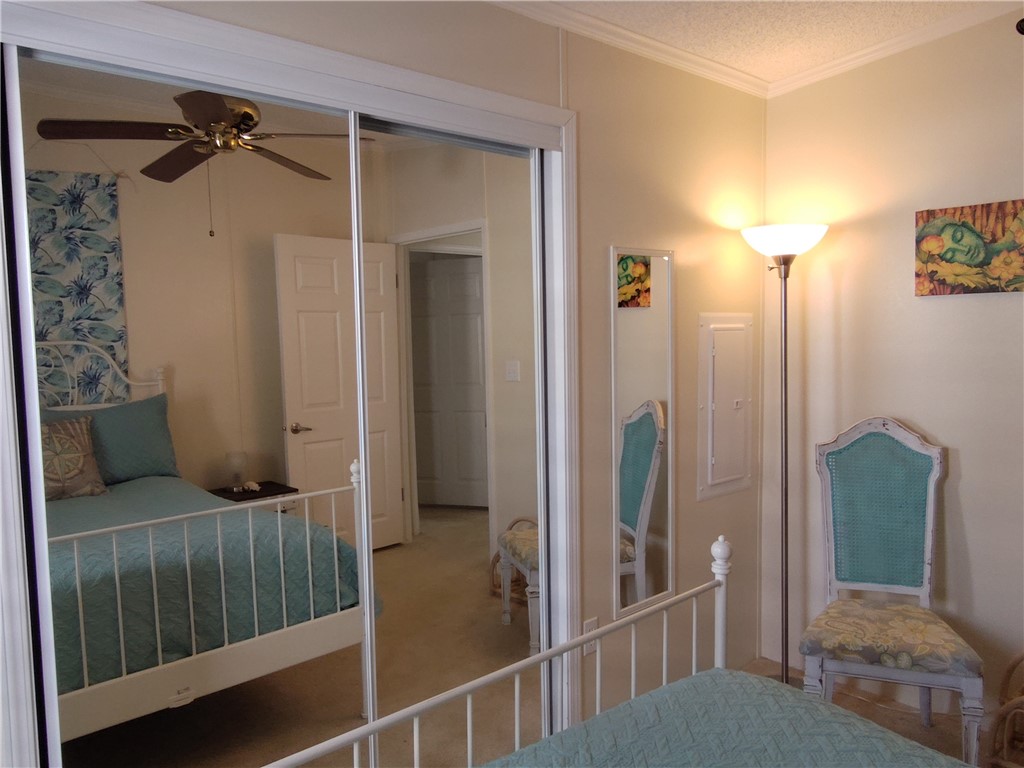 7490 133rd Place Sebastian, FL 32958 - Photo 14 of 25 a bedroom with furniture and a window