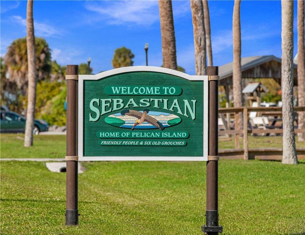7490 133rd Place Sebastian, FL 32958 - Photo 20 of 25 a sign on the side of the building