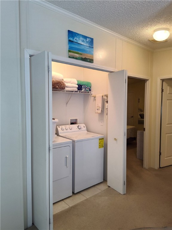 7490 133rd Place Sebastian, FL 32958 - Photo 9 of 25 a utility room with cabinets washer and dryer