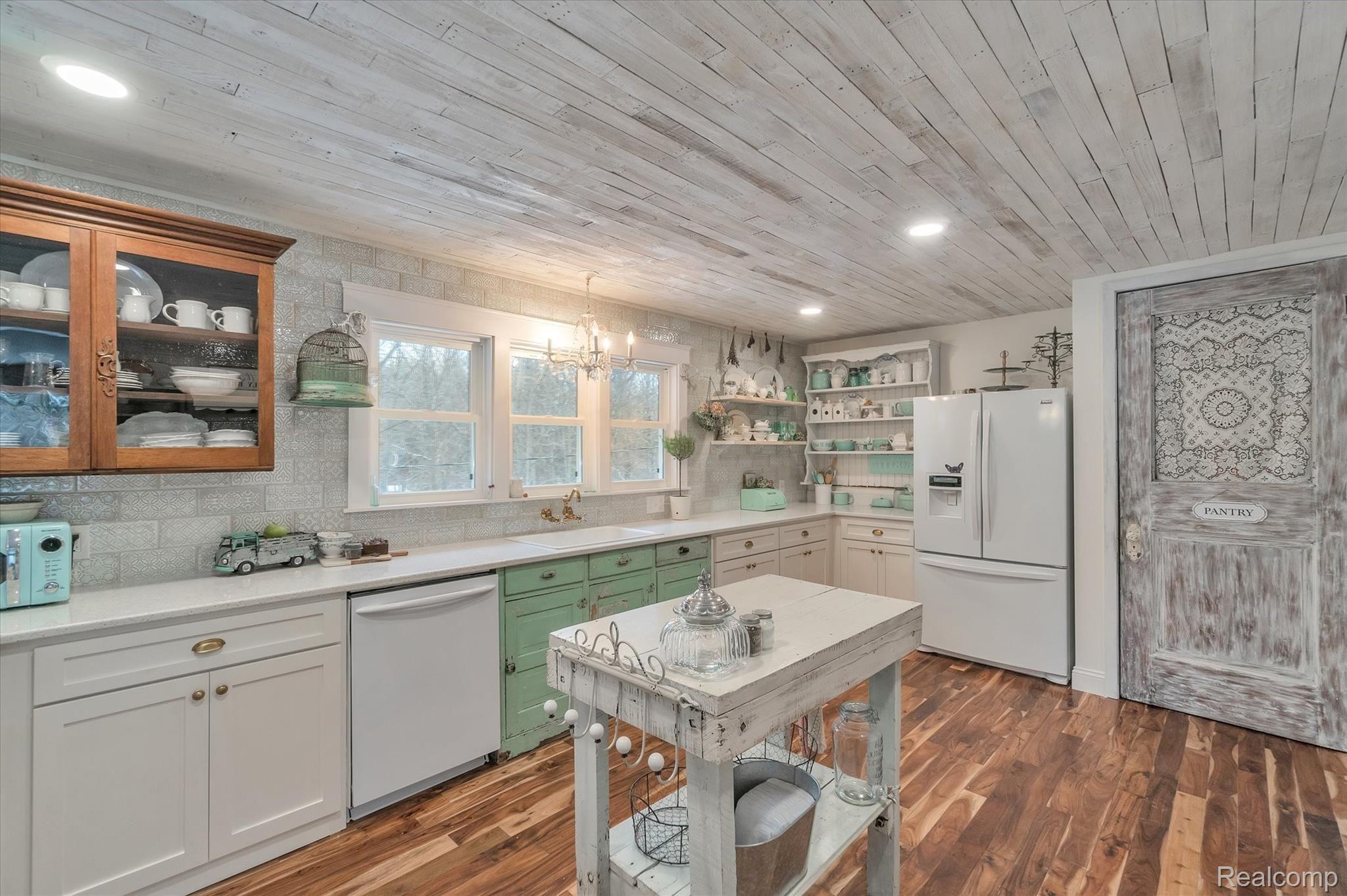 3000 Sanitorium Road Howell, MI 48843 - Photo 9 of 40 New Kitchen With Wood Ceiling, Wood Floors And Big Pantry