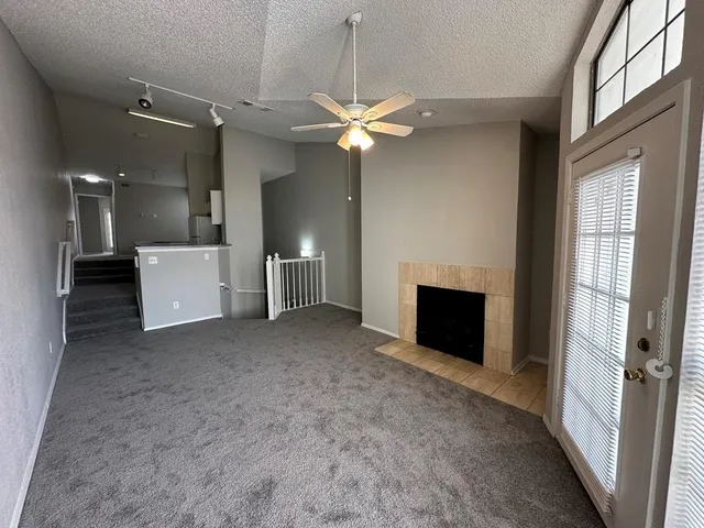 a view of a livingroom with a fireplace