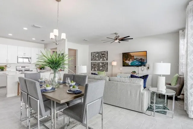a kitchen with a sink stove and refrigerator