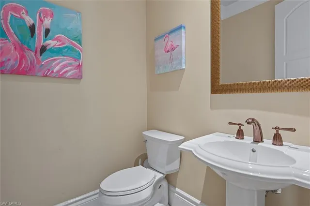 a bathroom with a sink and a toilet