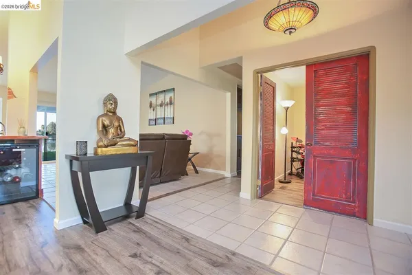 a bathroom with a granite countertop double vanity sink mirror and