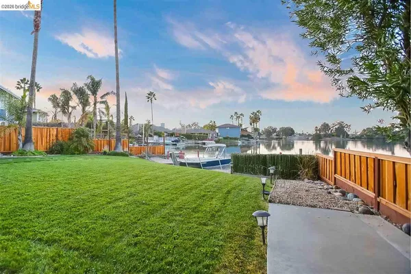 a view of a lake with houses lake and city view