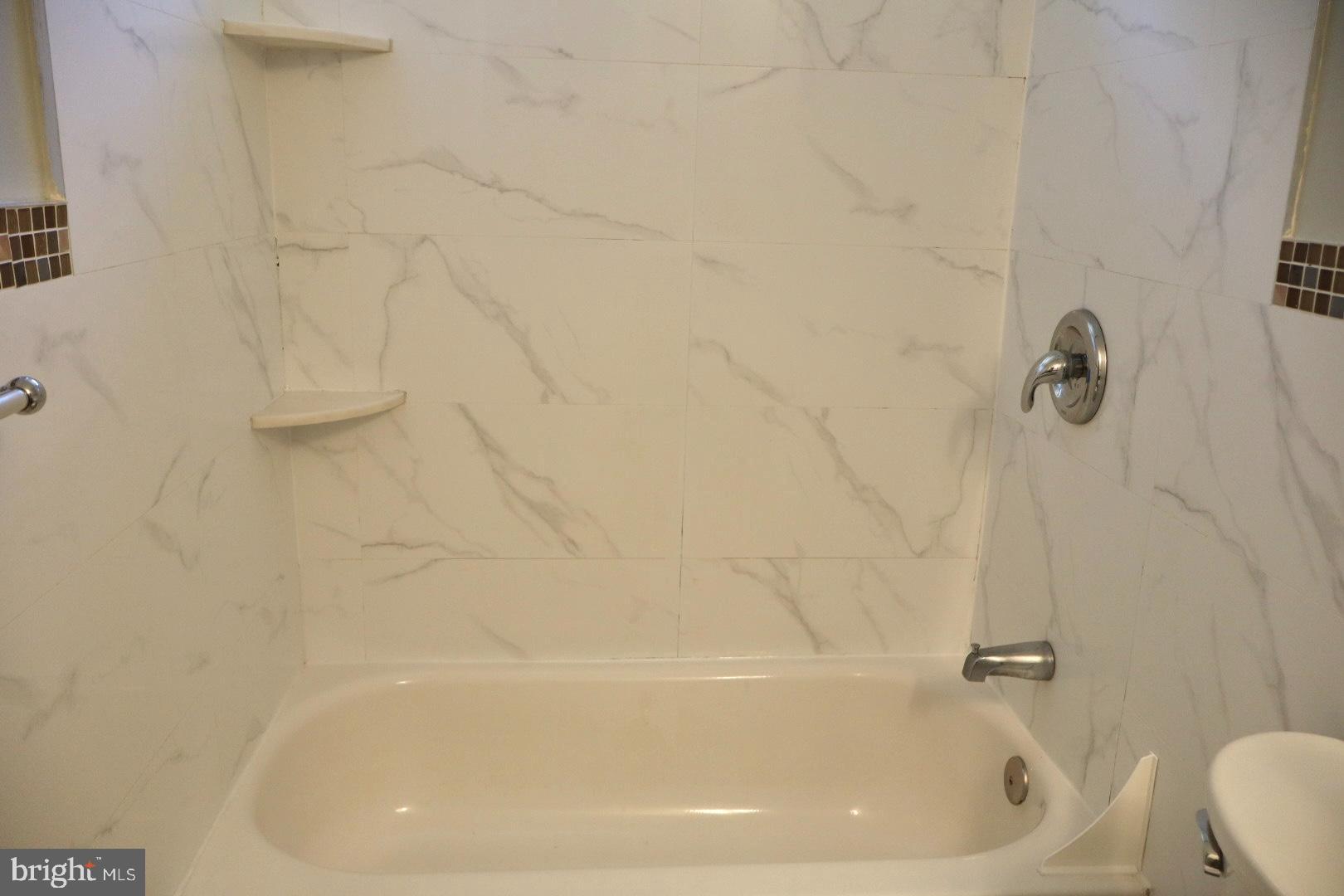 37 Moran Avenue Princeton, NJ 08542 - Photo 11 of 15 a bathroom with a bathtub