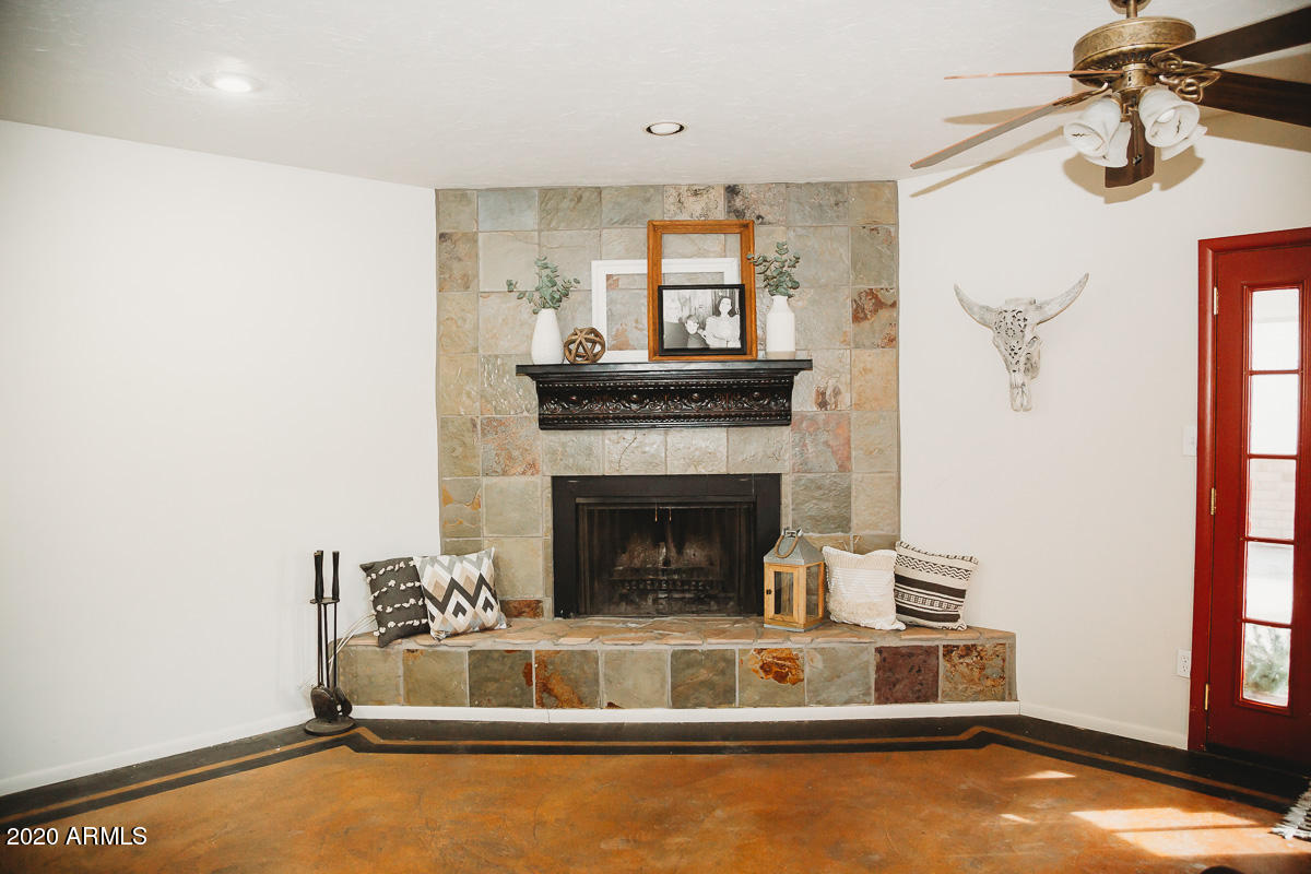 1570 North Trekell Road Casa Grande, AZ 85122 - Photo 9 of 30 Fireplace with slate tile facing