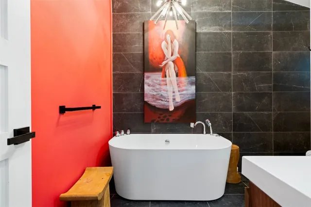 a bathroom with a sink and bathtub
