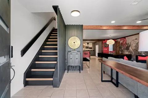 a room with lots of wooden furniture