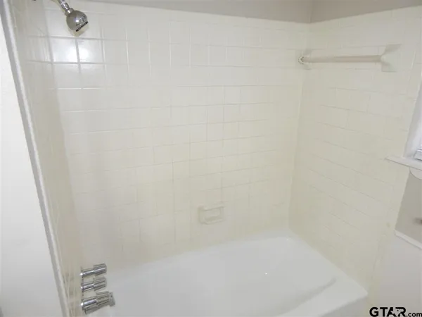 a close up of a bathtub