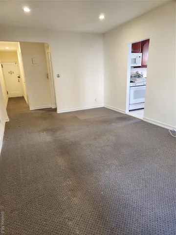 an empty room with window