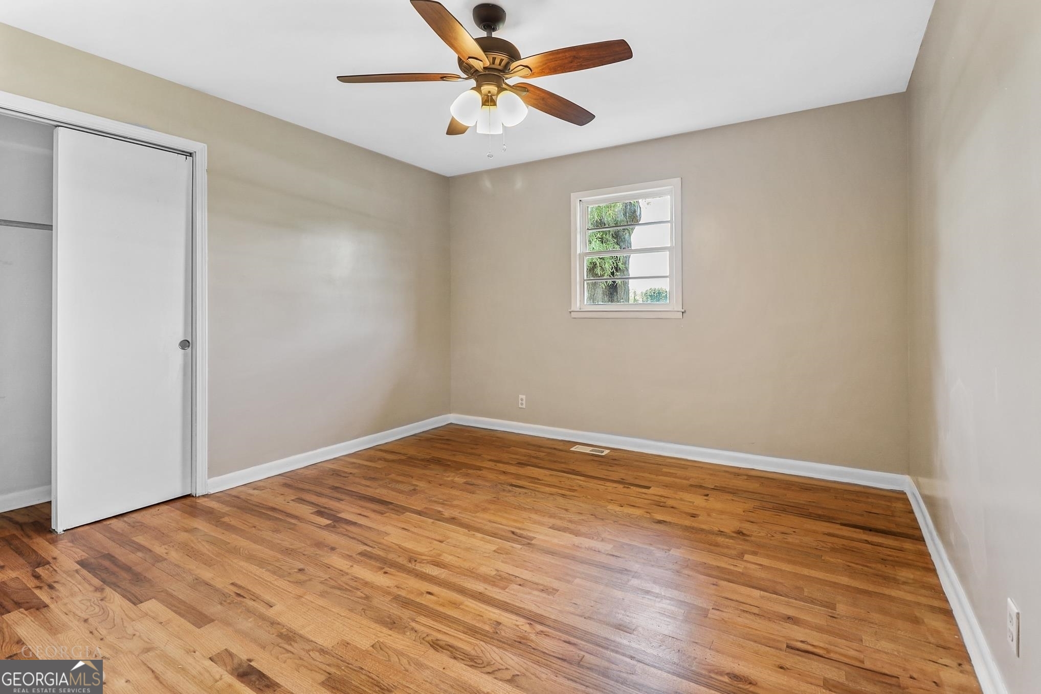 55 Welcome Sargent Road Newnan, GA 30263 - Photo 12 of 20 a view of empty room with wooden floor