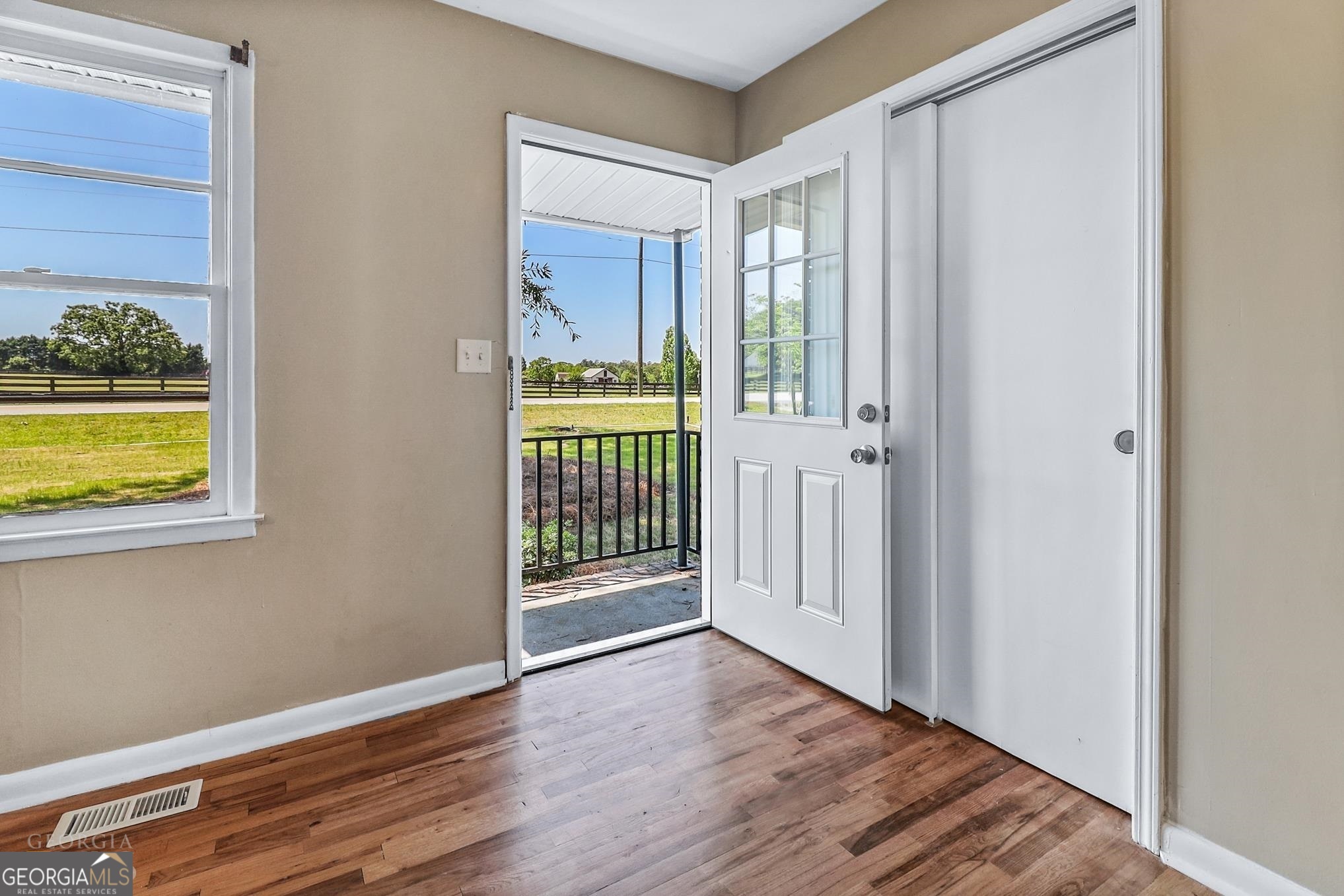55 Welcome Sargent Road Newnan, GA 30263 - Photo 2 of 20 a view of an entryway with wooden floor