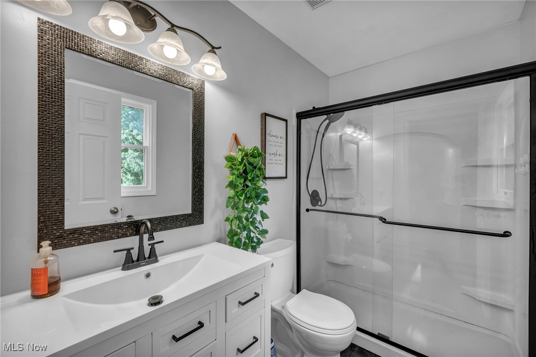 18945 Thorpe Road Chagrin Falls, OH 44023 - Photo 23 of 35 Full bath featuring a stall shower and vanity