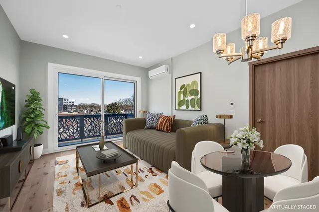 a kitchen with stainless steel appliances a refrigerator sink and microwave