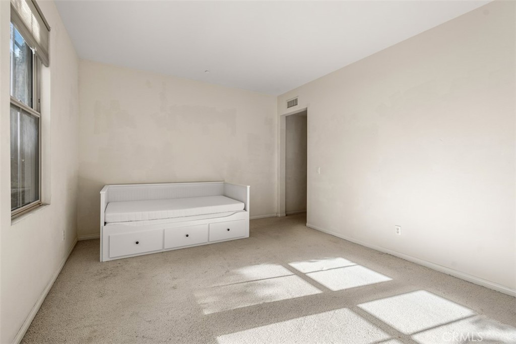 32 Serenity Irvine, CA 92618 - Photo 18 of 34 a view of an empty room with a window