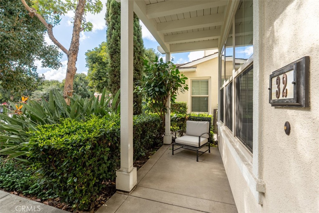 32 Serenity Irvine, CA 92618 - Photo 2 of 34 a view of a balcony with chair and potted plants