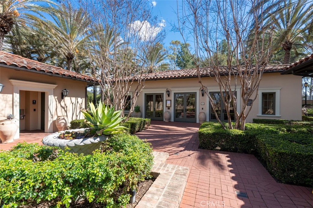 32 Serenity Irvine, CA 92618 - Photo 22 of 34 a front view of a house with garden