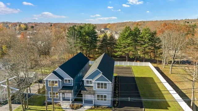 a view of a street with lots of trees