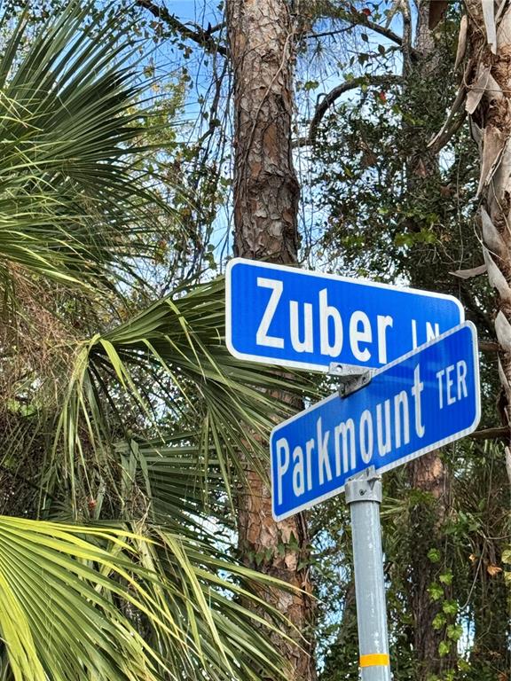 Zuber Ln Port North Port, FL 34286 - Photo 8 of 10 a street sign that is on a pole