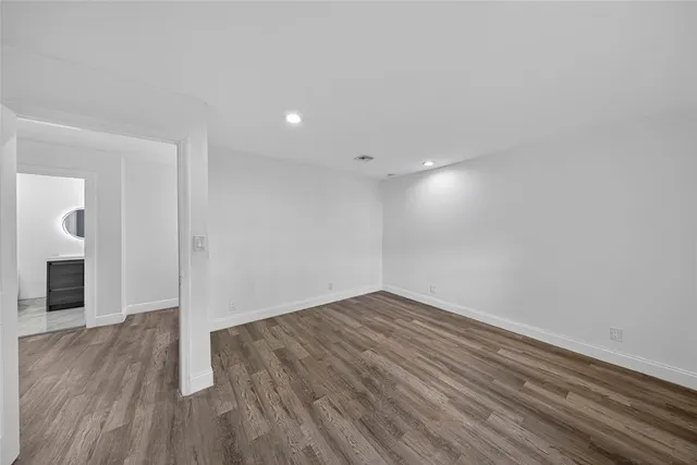 a view of a kitchen with a refrigerator and a refrigerator