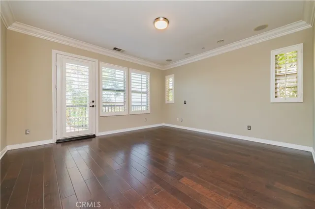 a bathroom with double sink and a mirror