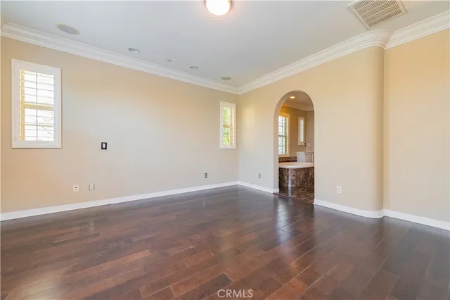 a bath tub sitting in a bathroom next to a window