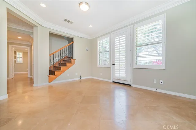 an empty room with windows