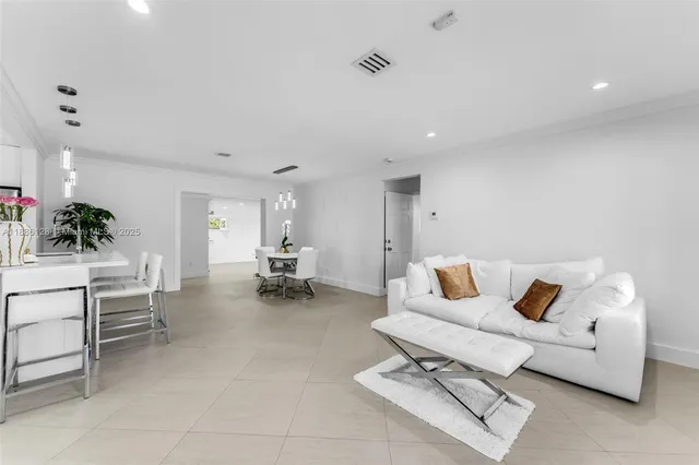 a living room with furniture and a couch