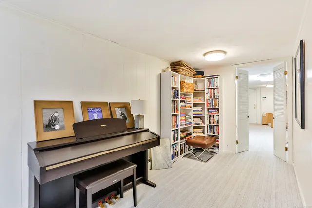 a view of a livingroom with furniture and window