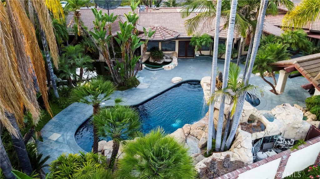 9022 La Alba Drive Whittier, CA 90603 - Photo 2 of 13 a view of backyard with plants and outdoor seating
