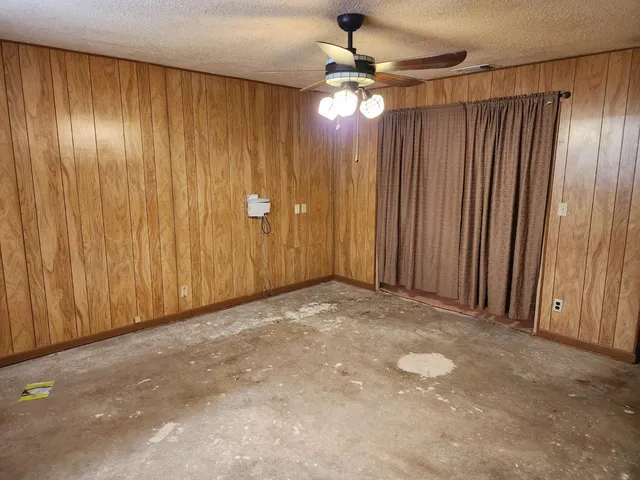 a view of backyard with tree