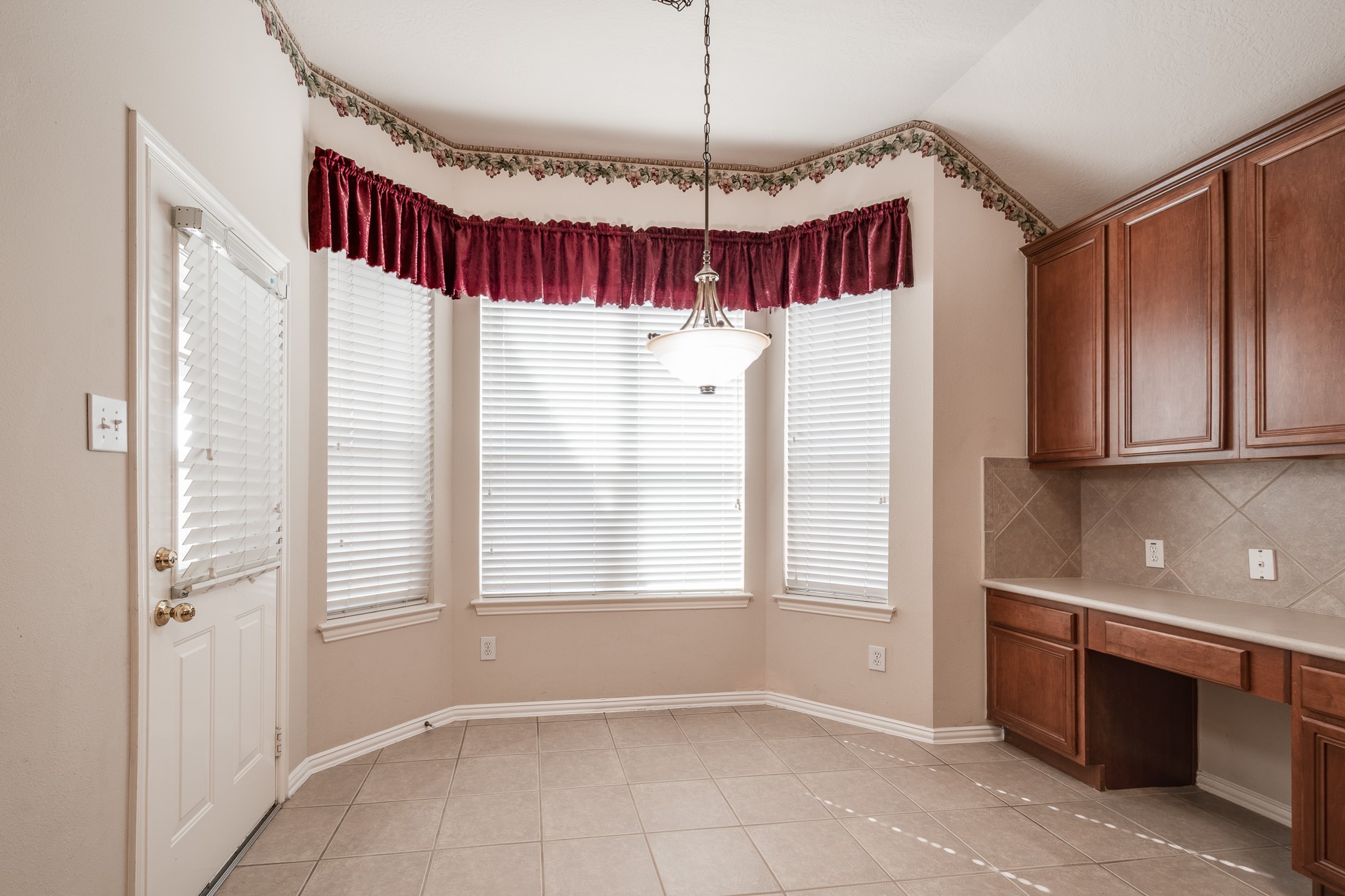 5914 Birdie Way Pasadena, TX 77505 - Photo 17 of 32 a view of a kitchen with a dishwasher and a window
