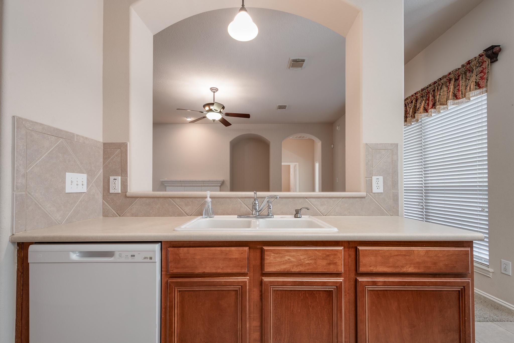 5914 Birdie Way Pasadena, TX 77505 - Photo 18 of 32 a bathroom with a sink and a mirror