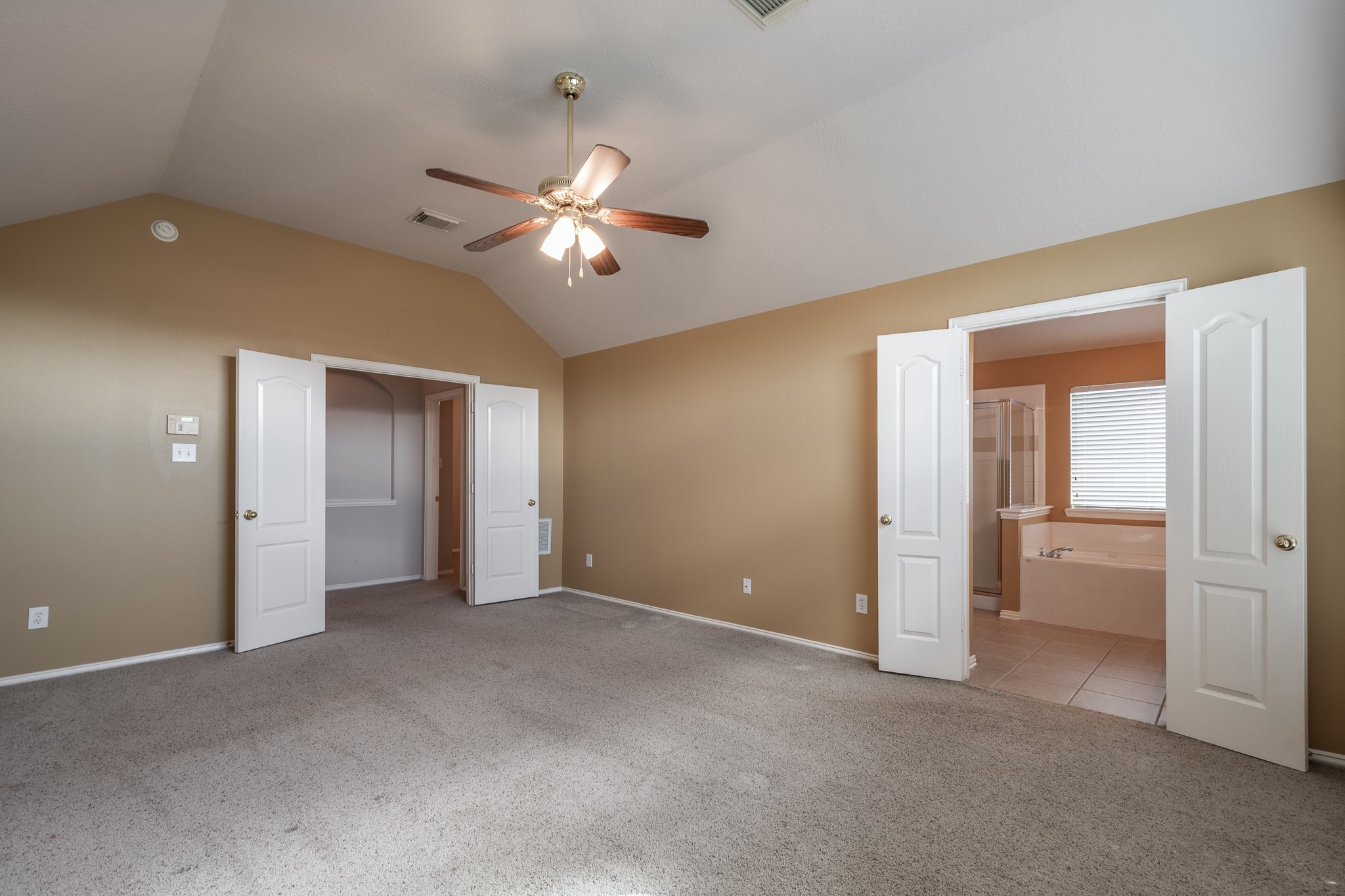 5914 Birdie Way Pasadena, TX 77505 - Photo 21 of 32 a view of empty room with a ceiling fan and window