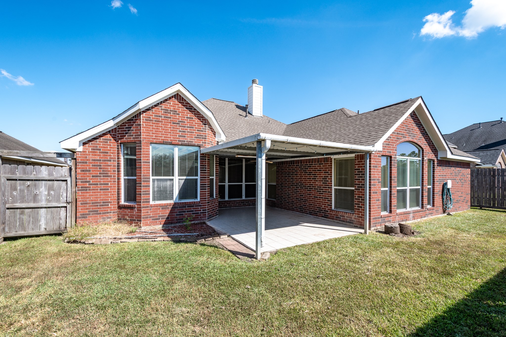 5914 Birdie Way Pasadena, TX 77505 - Photo 31 of 32 a view of a house with a yard and porch