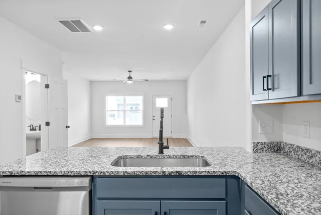a view of a sink and a window
