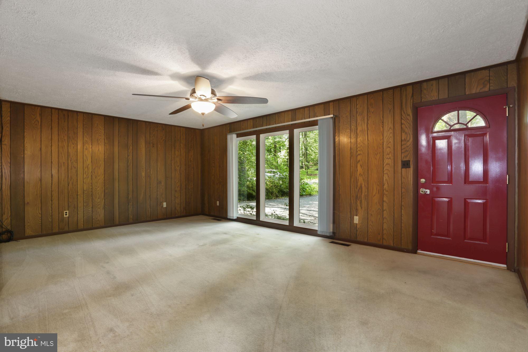 7202 Ridgeway Drive Manassas, VA 20112 - Photo 6 of 36 LIVING ROOM WITH WALNUT PANELING