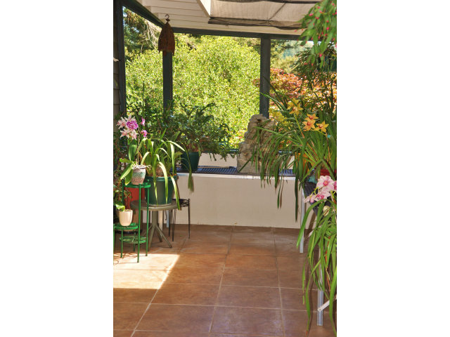 10250 Alba Road Ben Lomond, CA 95005 - Photo 7 of 12 a view of a room with a furniture and floor to ceiling window