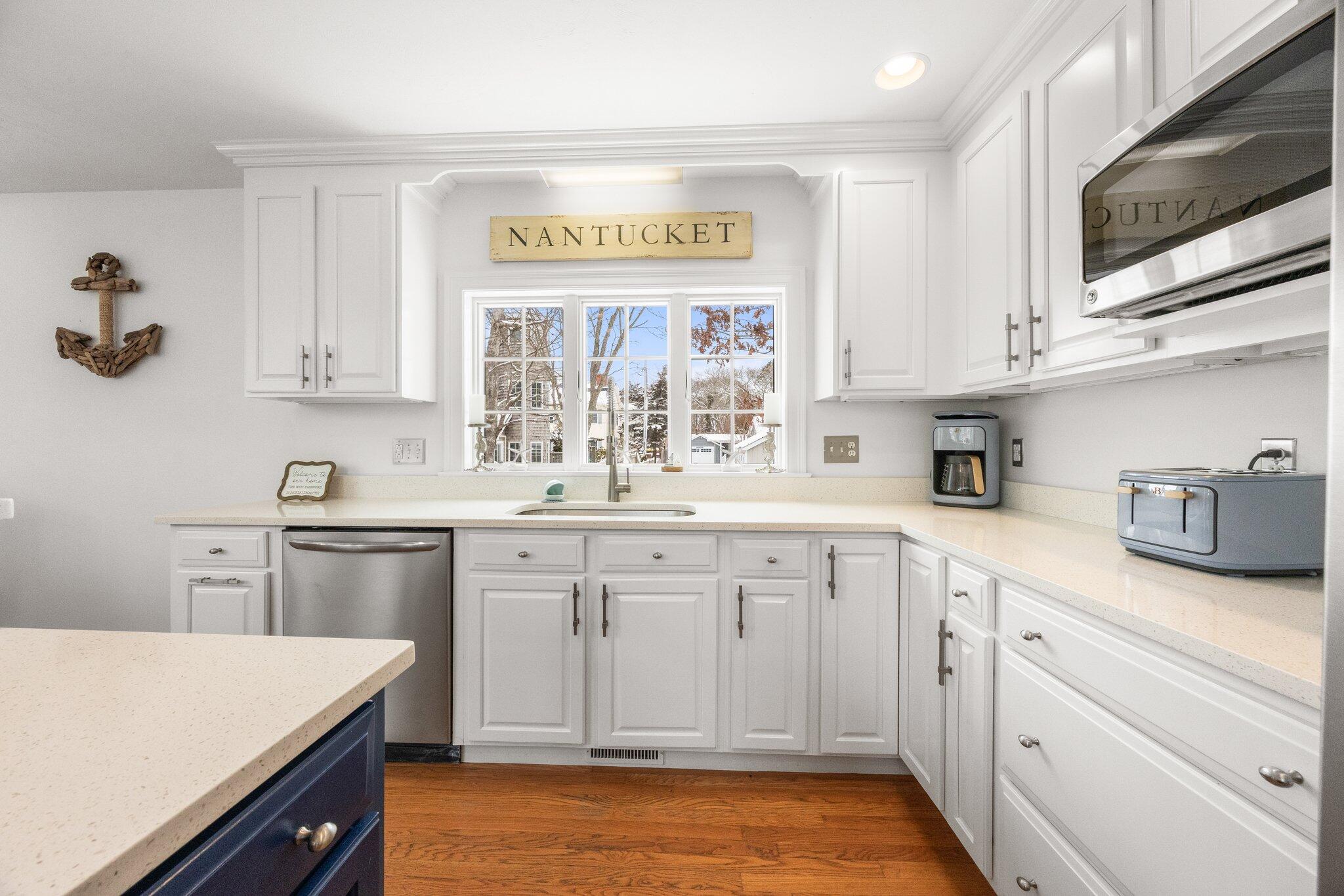21 Bayview Road Mashpee, MA 02649 - Photo 14 of 85 a kitchen with appliances cabinets and a sink