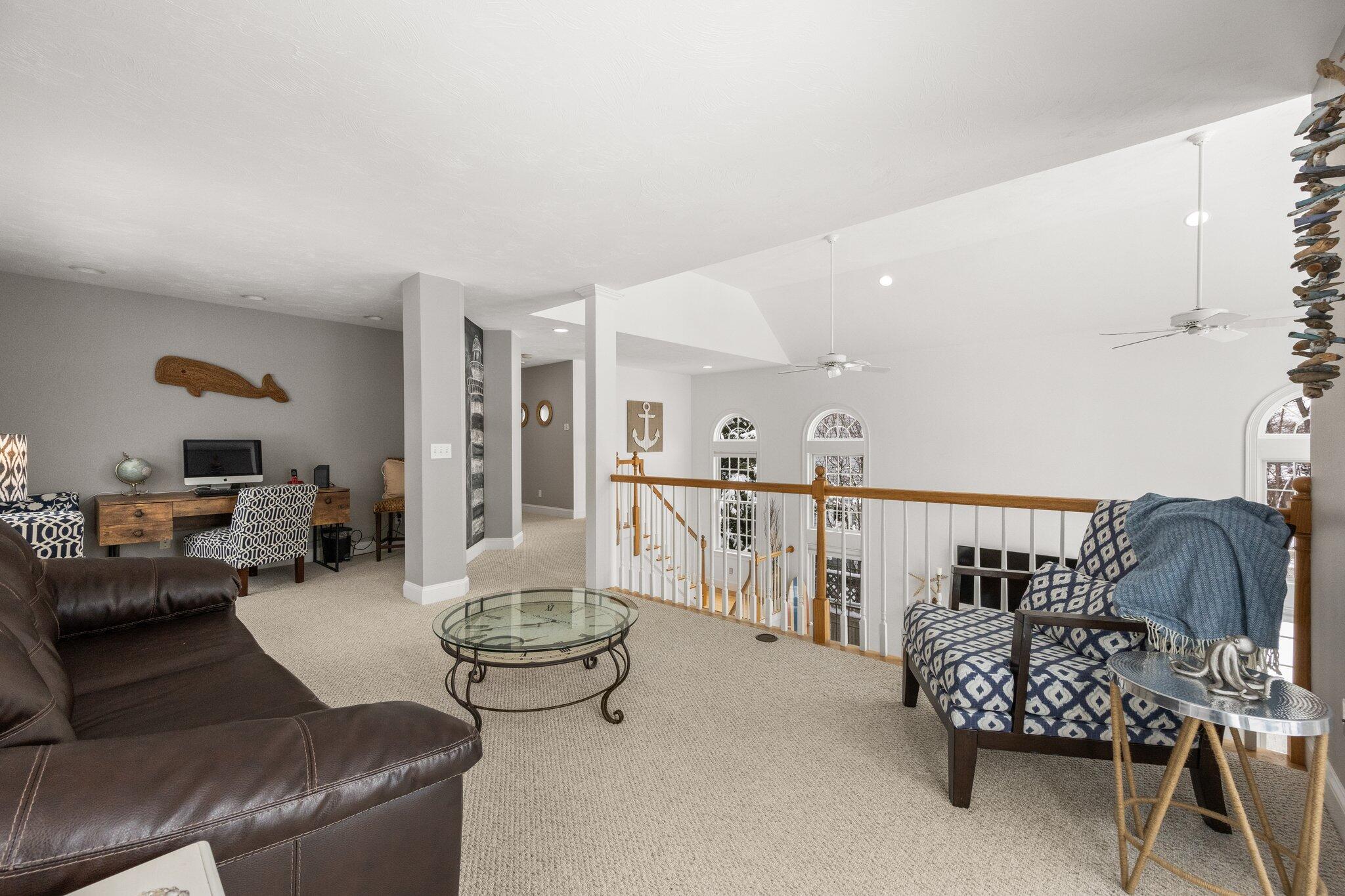 21 Bayview Road Mashpee, MA 02649 - Photo 33 of 85 a living room with furniture and wooden floor