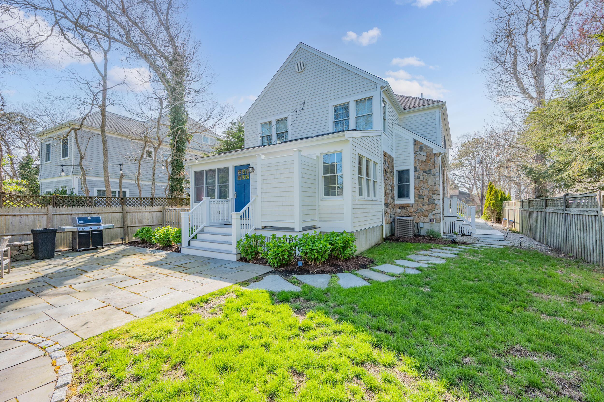 21 Bayview Road Mashpee, MA 02649 - Photo 60 of 85 a front view of a house with garden