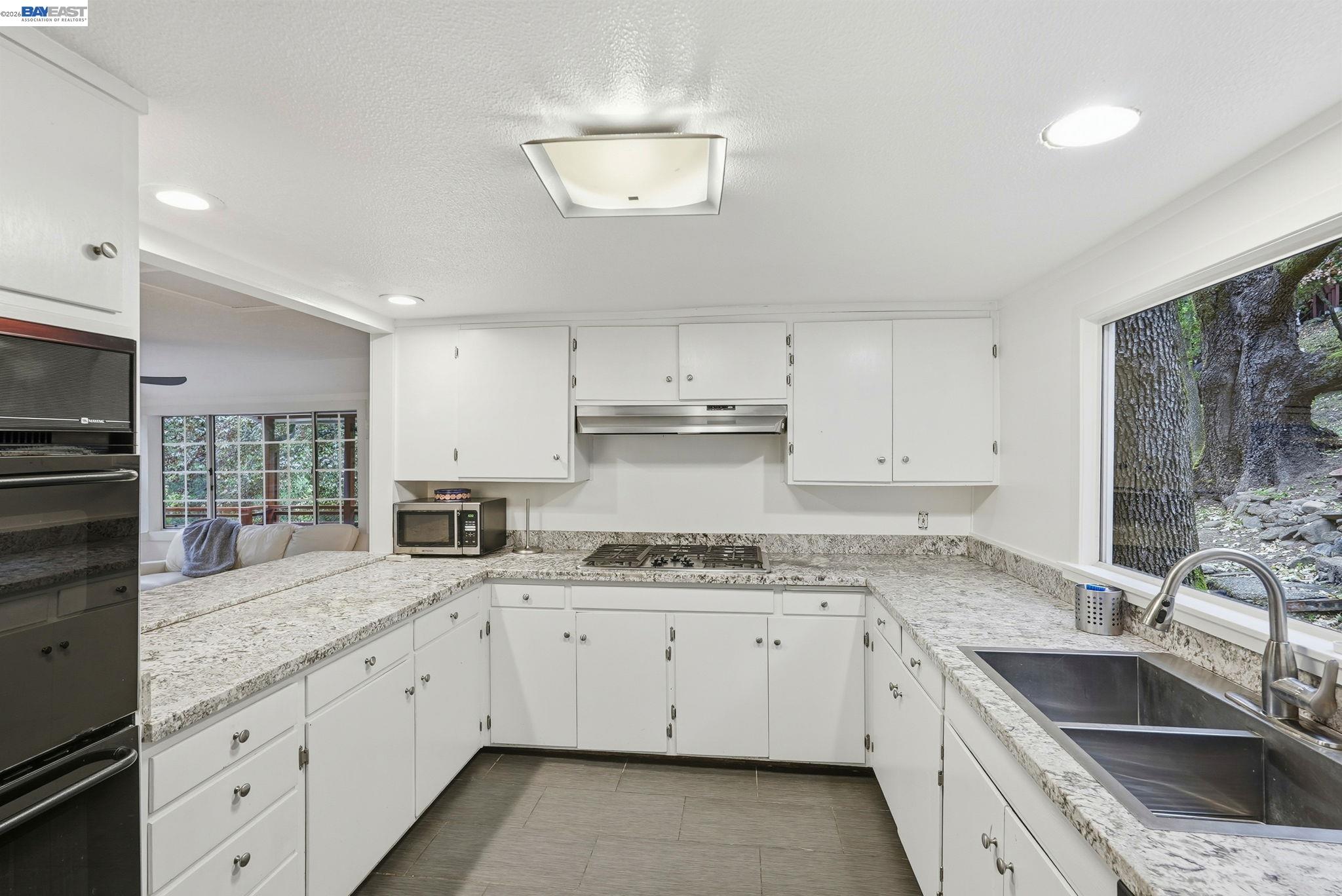 2929 Kilkare Road Sunol, CA 94586 - Photo 14 of 40 a kitchen with granite countertop a sink stainless steel appliances and cabinets