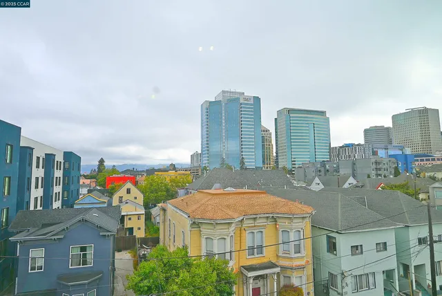 a view of city with tall buildings