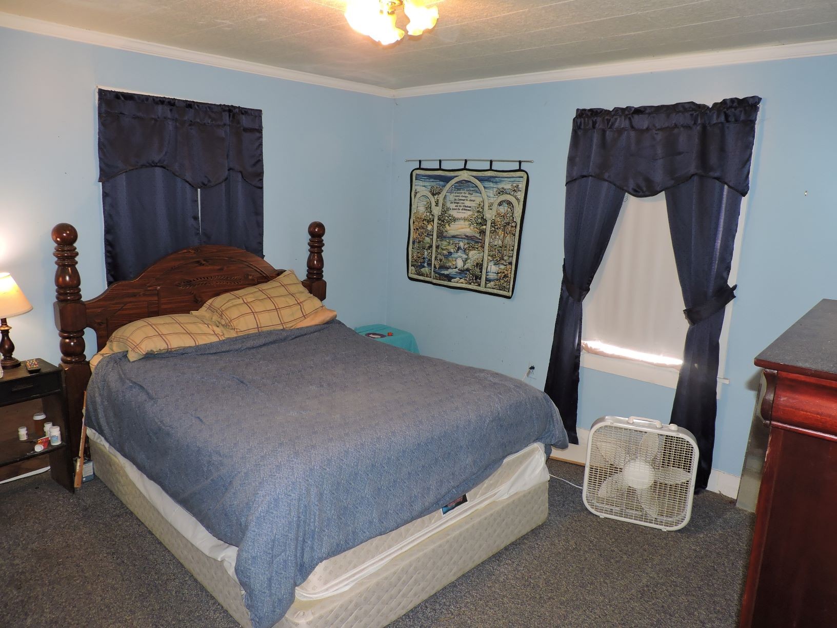 10891 Murfreesboro Road Lebanon, TN 37090 - Photo 13 of 16 a bedroom with a bed and a window