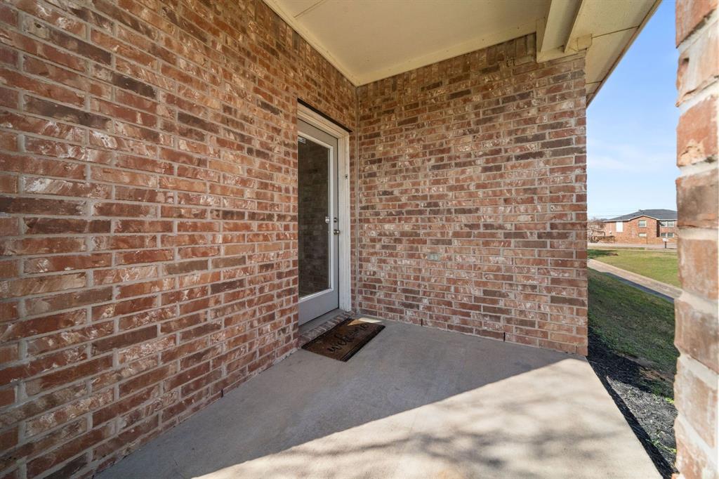 908 West Wintergreen Road Lancaster, TX 75134 - Photo 34 of 38 a bathroom with a shower
