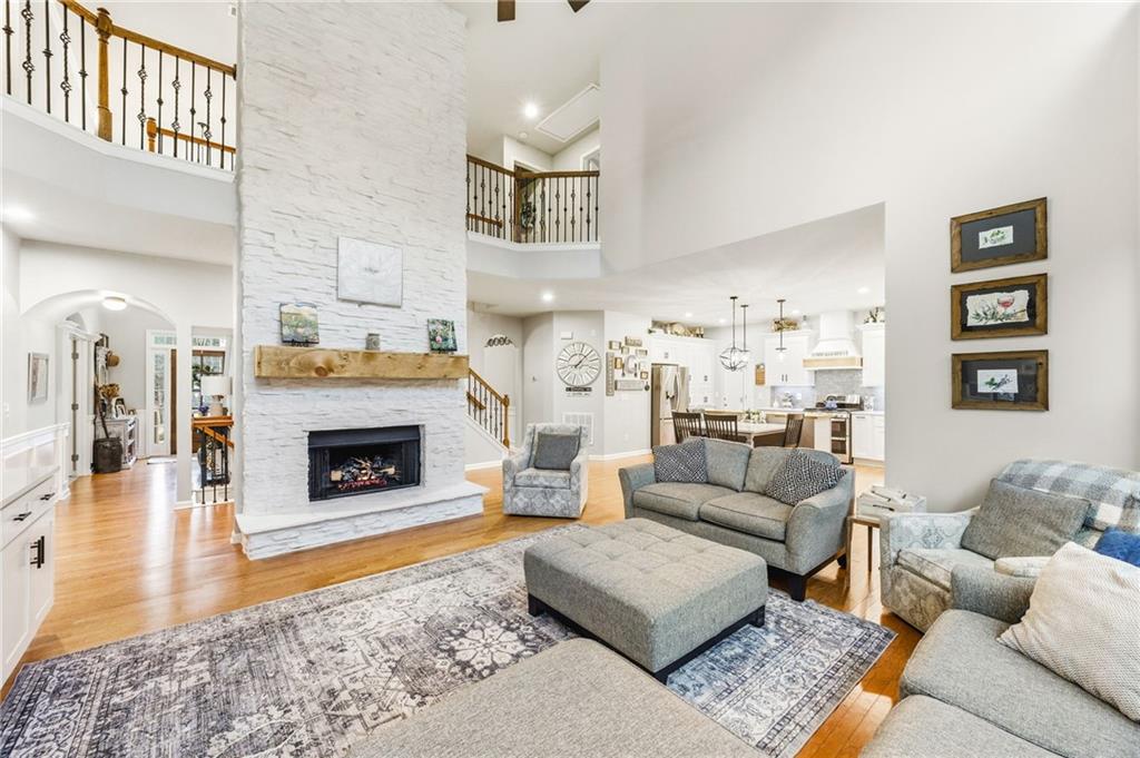 1122 Flagstone Way Acworth, GA 30101 - Photo 13 of 50 a living room with furniture and a fireplace