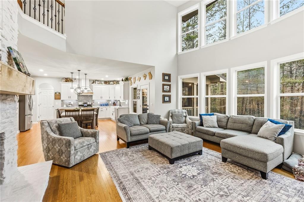 1122 Flagstone Way Acworth, GA 30101 - Photo 14 of 50 a living room with furniture and a large window