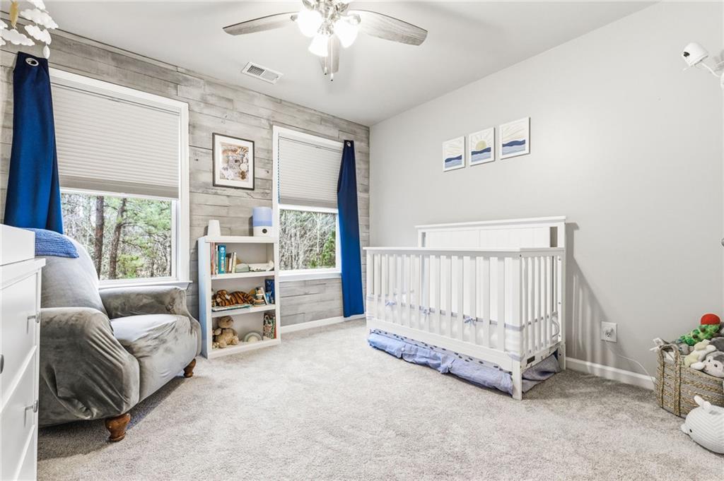 1122 Flagstone Way Acworth, GA 30101 - Photo 37 of 50 a view of livingroom with furniture and windows